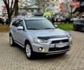 Серый Мицубиси Аутлендер ХЛ, объемом двигателя 2.2 л и пробегом 268 тыс. км за 11500 $, фото 1 на Automoto.ua