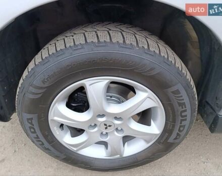 Серый Мицубиси Аутлендер ХЛ, объемом двигателя 2 л и пробегом 209 тыс. км за 9555 $, фото 44 на Automoto.ua