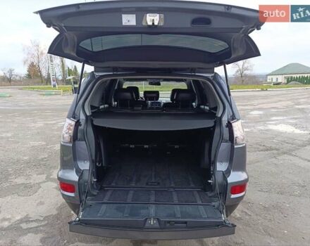 Серый Мицубиси Аутлендер ХЛ, объемом двигателя 2.3 л и пробегом 289 тыс. км за 10333 $, фото 36 на Automoto.ua