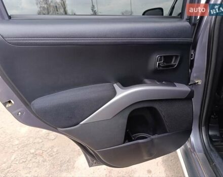 Серый Мицубиси Аутлендер ХЛ, объемом двигателя 2.3 л и пробегом 289 тыс. км за 10333 $, фото 32 на Automoto.ua