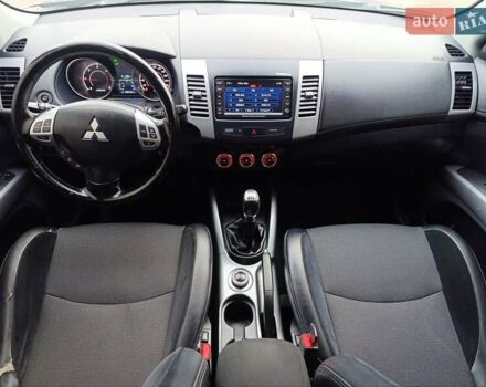 Серый Мицубиси Аутлендер ХЛ, объемом двигателя 2.3 л и пробегом 289 тыс. км за 10333 $, фото 30 на Automoto.ua