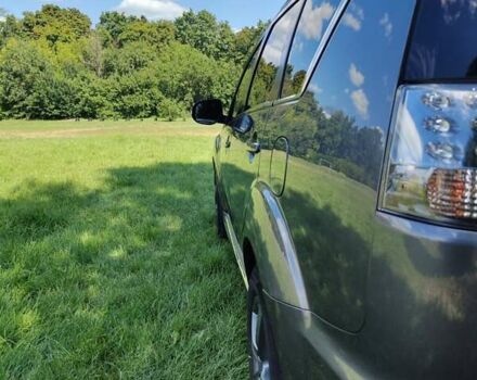 Серый Мицубиси Аутлендер ХЛ, объемом двигателя 2.36 л и пробегом 235 тыс. км за 10800 $, фото 5 на Automoto.ua