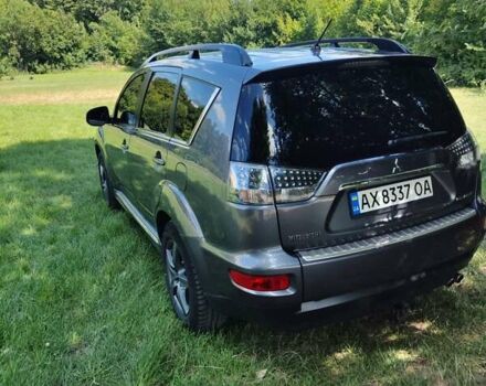 Серый Мицубиси Аутлендер ХЛ, объемом двигателя 2.36 л и пробегом 235 тыс. км за 10800 $, фото 4 на Automoto.ua