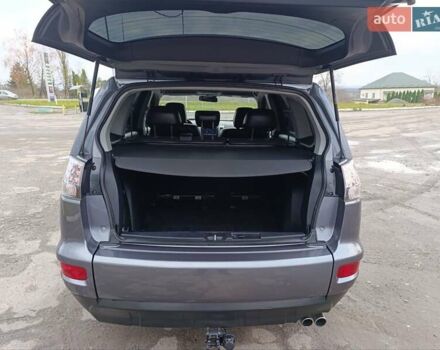 Серый Мицубиси Аутлендер ХЛ, объемом двигателя 2.3 л и пробегом 289 тыс. км за 10333 $, фото 39 на Automoto.ua