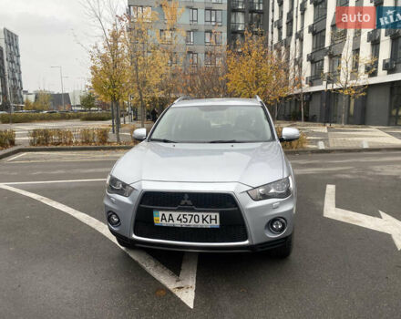 Серый Мицубиси Аутлендер ХЛ, объемом двигателя 2.4 л и пробегом 182 тыс. км за 9800 $, фото 5 на Automoto.ua