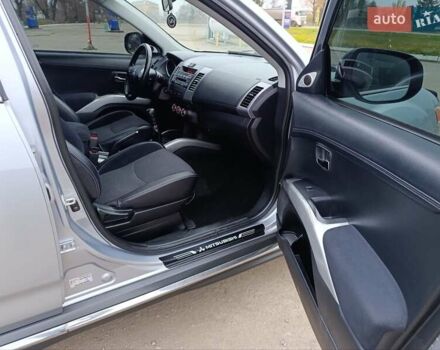 Серый Мицубиси Аутлендер ХЛ, объемом двигателя 2 л и пробегом 209 тыс. км за 9555 $, фото 26 на Automoto.ua