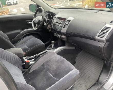 Серый Мицубиси Аутлендер ХЛ, объемом двигателя 2.4 л и пробегом 182 тыс. км за 9800 $, фото 14 на Automoto.ua