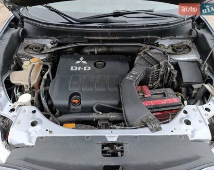 Серый Мицубиси Аутлендер ХЛ, объемом двигателя 2 л и пробегом 209 тыс. км за 9555 $, фото 43 на Automoto.ua