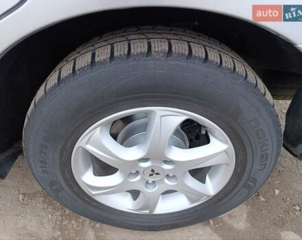 Серый Мицубиси Аутлендер ХЛ, объемом двигателя 2 л и пробегом 209 тыс. км за 9555 $, фото 45 на Automoto.ua