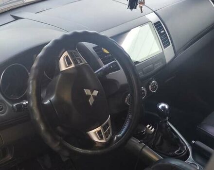 Серый Мицубиси Аутлендер ХЛ, объемом двигателя 2.36 л и пробегом 235 тыс. км за 10800 $, фото 12 на Automoto.ua