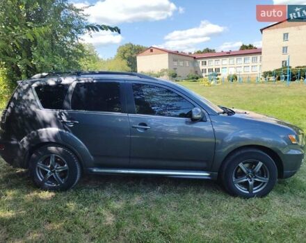 Серый Мицубиси Аутлендер ХЛ, объемом двигателя 2.36 л и пробегом 235 тыс. км за 10800 $, фото 1 на Automoto.ua