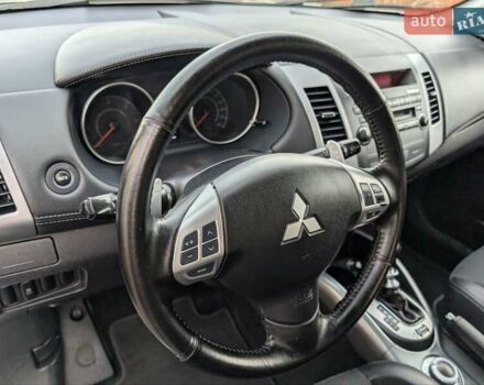 Серый Мицубиси Аутлендер ХЛ, объемом двигателя 2.2 л и пробегом 266 тыс. км за 11250 $, фото 40 на Automoto.ua