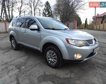 Серый Мицубиси Аутлендер ХЛ, объемом двигателя 2.4 л и пробегом 307 тыс. км за 8299 $, фото 1 на Automoto.ua