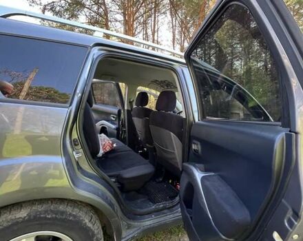 Сірий Міцубісі Аутлендер ХЛ, об'ємом двигуна 2 л та пробігом 247 тис. км за 5000 $, фото 1 на Automoto.ua