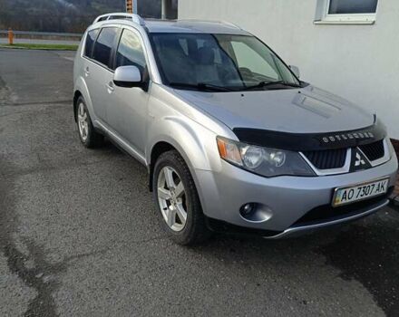 Серый Мицубиси Аутлендер ХЛ, объемом двигателя 2.36 л и пробегом 260 тыс. км за 8800 $, фото 1 на Automoto.ua