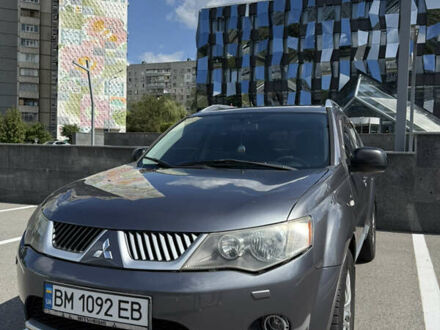 Серый Мицубиси Аутлендер ХЛ, объемом двигателя 3 л и пробегом 270 тыс. км за 9500 $, фото 1 на Automoto.ua