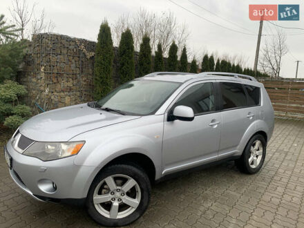 Серый Мицубиси Аутлендер ХЛ, объемом двигателя 2 л и пробегом 310 тыс. км за 6999 $, фото 1 на Automoto.ua