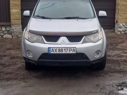 Сірий Міцубісі Аутлендер ХЛ, об'ємом двигуна 2.4 л та пробігом 260 тис. км за 7500 $, фото 1 на Automoto.ua