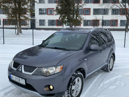 Серый Мицубиси Аутлендер ХЛ, объемом двигателя 2.36 л и пробегом 225 тыс. км за 8999 $, фото 1 на Automoto.ua