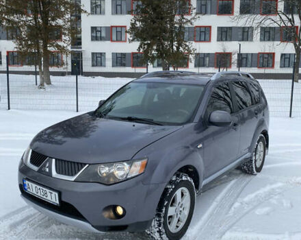 Серый Мицубиси Аутлендер ХЛ, объемом двигателя 2.36 л и пробегом 225 тыс. км за 8999 $, фото 1 на Automoto.ua