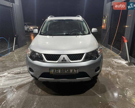 Серый Мицубиси Аутлендер ХЛ, объемом двигателя 2.36 л и пробегом 208 тыс. км за 7800 $, фото 1 на Automoto.ua