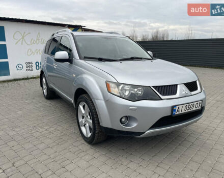 Серый Мицубиси Аутлендер ХЛ, объемом двигателя 2.36 л и пробегом 184 тыс. км за 8500 $, фото 1 на Automoto.ua
