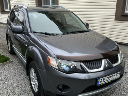 Серый Мицубиси Аутлендер ХЛ, объемом двигателя 2.36 л и пробегом 153 тыс. км за 11500 $, фото 1 на Automoto.ua