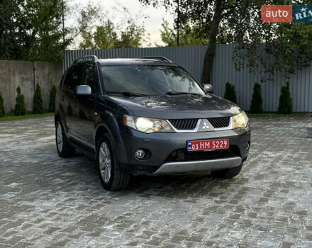 Серый Мицубиси Аутлендер ХЛ, объемом двигателя 2 л и пробегом 232 тыс. км за 9599 $, фото 1 на Automoto.ua