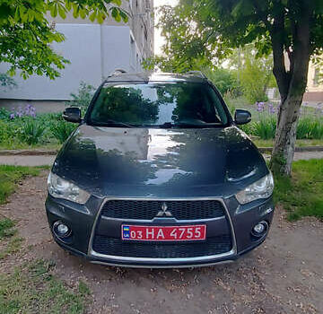 Сірий Міцубісі Аутлендер ХЛ, об'ємом двигуна 2.4 л та пробігом 239 тис. км за 10600 $, фото 1 на Automoto.ua