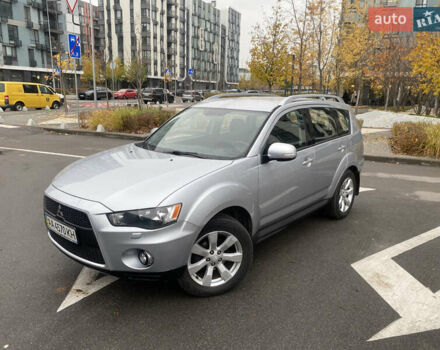 Серый Мицубиси Аутлендер ХЛ, объемом двигателя 2.4 л и пробегом 182 тыс. км за 9800 $, фото 1 на Automoto.ua