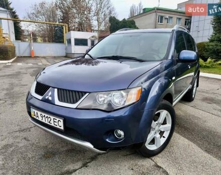 Синий Мицубиси Аутлендер ХЛ, объемом двигателя 3 л и пробегом 197 тыс. км за 9200 $, фото 1 на Automoto.ua