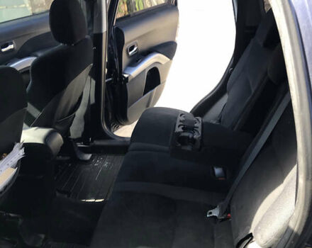 Синий Мицубиси Аутлендер ХЛ, объемом двигателя 2.4 л и пробегом 295 тыс. км за 7600 $, фото 13 на Automoto.ua