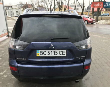 Синий Мицубиси Аутлендер ХЛ, объемом двигателя 2.4 л и пробегом 295 тыс. км за 7600 $, фото 2 на Automoto.ua