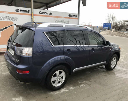 Синий Мицубиси Аутлендер ХЛ, объемом двигателя 2.4 л и пробегом 295 тыс. км за 7600 $, фото 3 на Automoto.ua