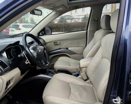 Синий Мицубиси Аутлендер ХЛ, объемом двигателя 3 л и пробегом 197 тыс. км за 9200 $, фото 17 на Automoto.ua