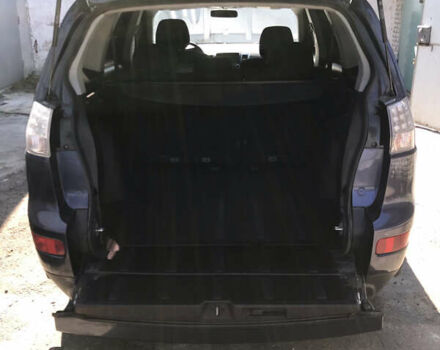 Синий Мицубиси Аутлендер ХЛ, объемом двигателя 2.4 л и пробегом 295 тыс. км за 7600 $, фото 10 на Automoto.ua