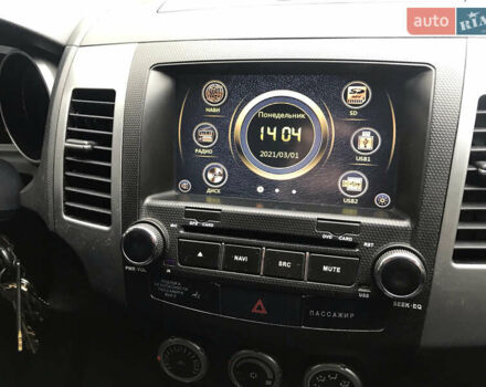 Синий Мицубиси Аутлендер ХЛ, объемом двигателя 2.4 л и пробегом 295 тыс. км за 7600 $, фото 5 на Automoto.ua