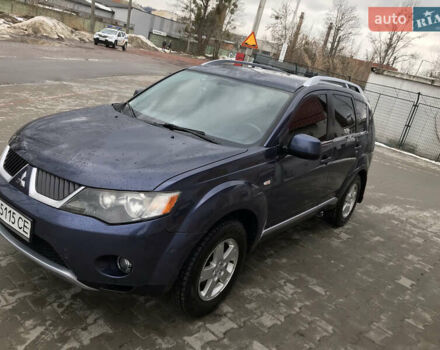Синий Мицубиси Аутлендер ХЛ, объемом двигателя 2.4 л и пробегом 295 тыс. км за 7600 $, фото 1 на Automoto.ua