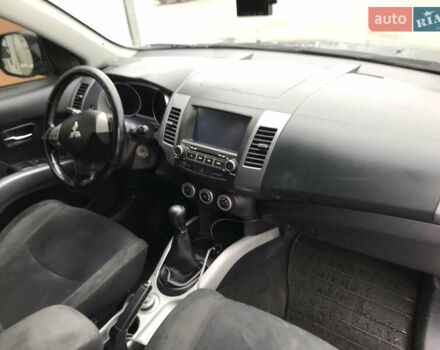 Синий Мицубиси Аутлендер ХЛ, объемом двигателя 2.4 л и пробегом 295 тыс. км за 7600 $, фото 11 на Automoto.ua