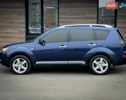 Синий Мицубиси Аутлендер ХЛ, объемом двигателя 2.4 л и пробегом 249 тыс. км за 8800 $, фото 5 на Automoto.ua