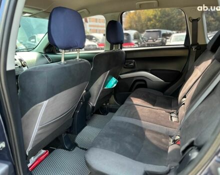 Синий Мицубиси Аутлендер ХЛ, объемом двигателя 2.4 л и пробегом 215 тыс. км за 9290 $, фото 11 на Automoto.ua