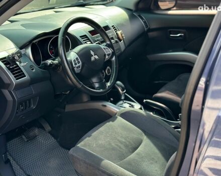 Синий Мицубиси Аутлендер ХЛ, объемом двигателя 2.4 л и пробегом 215 тыс. км за 9290 $, фото 20 на Automoto.ua