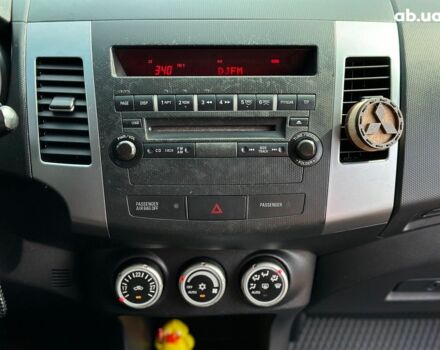 Синий Мицубиси Аутлендер ХЛ, объемом двигателя 2.4 л и пробегом 215 тыс. км за 9290 $, фото 18 на Automoto.ua