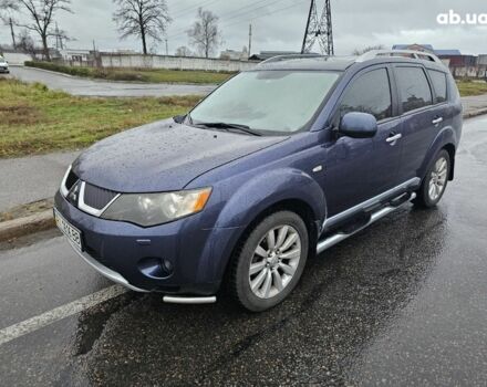 Синий Мицубиси Аутлендер ХЛ, объемом двигателя 2.4 л и пробегом 282 тыс. км за 9500 $, фото 3 на Automoto.ua