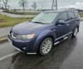 Синий Мицубиси Аутлендер ХЛ, объемом двигателя 2.4 л и пробегом 282 тыс. км за 9500 $, фото 3 на Automoto.ua