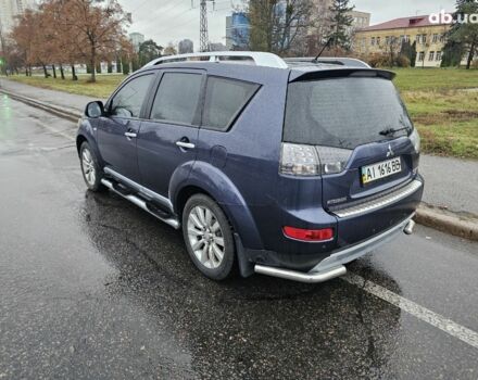 Синий Мицубиси Аутлендер ХЛ, объемом двигателя 2.4 л и пробегом 282 тыс. км за 9500 $, фото 4 на Automoto.ua