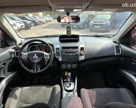 Синий Мицубиси Аутлендер ХЛ, объемом двигателя 2.4 л и пробегом 215 тыс. км за 9290 $, фото 12 на Automoto.ua