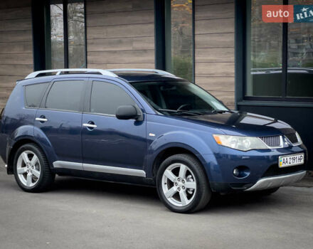 Синий Мицубиси Аутлендер ХЛ, объемом двигателя 2.4 л и пробегом 249 тыс. км за 8800 $, фото 12 на Automoto.ua