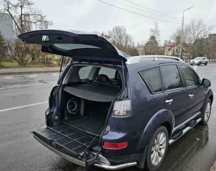 Синий Мицубиси Аутлендер ХЛ, объемом двигателя 2.4 л и пробегом 282 тыс. км за 9500 $, фото 9 на Automoto.ua