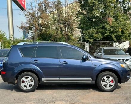 Синий Мицубиси Аутлендер ХЛ, объемом двигателя 2.4 л и пробегом 215 тыс. км за 9290 $, фото 5 на Automoto.ua